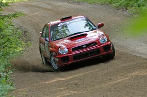 Dave Anton / Dominik Jozwiak set up their Subaru WRX STi for a fast left-hander on SS2.