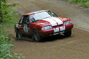Mark Utecht / Rob Bohn at speed through a left-hander on SS2 in their Ford Mustang.