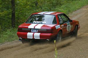 Mark Utecht / Rob Bohn exit a fast left-hander on SS2 in their Ford Mustang.