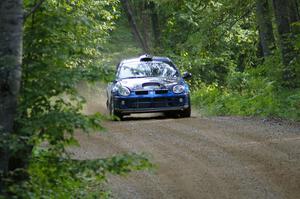 Cary Kendall / Scott Friberg blast down a straight on SS2 in their Dodge SRT-4.