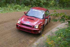 Bryan Pepp / Jerry Stang at a fast left-hander on SS2 in their Subaru WRX.