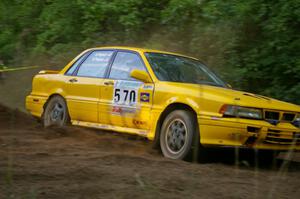 Erik Payeur / Adam Payeur power their Mitsubishi Galant through a hard right-hand hairpin on SS3.