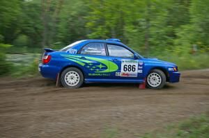 Bruce Davis / Jimmy Brandt Dodge SRT-4 comes into a sharp hairpin on SS3.