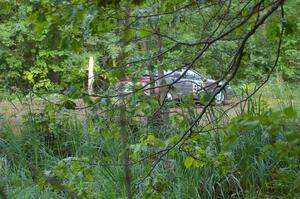 Erick Nelson / Greg Messler Plymouth	Laser through the trees at a hairpin on SS3.