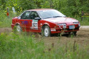 Jonah Liubakka / Craig Walli Saturn SL2 at a hairpin on SS3.