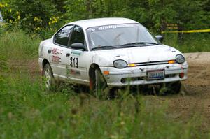 Chris Greenhouse / Don DeRose exit out of a hairpin on SS3 in their Plymouth Neon.