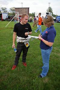 Bruce Davis steps out at Akeley service from the Dodge SRT-4 that he and Jimmy Brandt share.