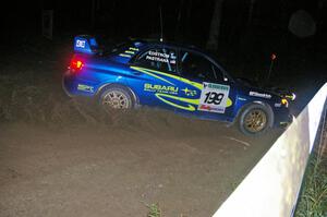 Travis Pastrana / Christian Edstrom Subaru WRX STi blasts gravel on SS8, Kabekona, at the spectator point.