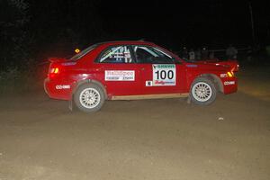 Dave Anton / Dominik Jozwiak carry too much speed into the spectator point on SS8, Kabekona, in their Subaru WRX STi.
