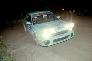 Eric Langbein / Jeremy Wimpey sling gravel in their Subaru WRX at a 90 right-hander on SS8, Kabekona.