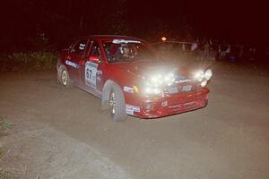 Bryan Pepp / Jerry Stang power out of a 90-right at the spectator point on SS8, Kabekona, in their Subaru WRX.