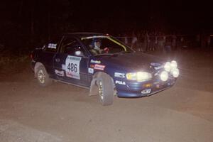 Martin Menning / Ryan Schnell Subaru Impreza at the spectator point on SS8, Kabekona.