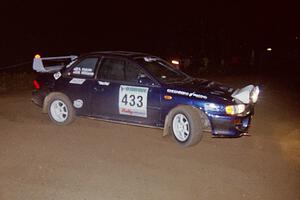 Mitch Williams / Alix Hakala Subaru Impreza at the spectator point on SS8, Kabekona.
