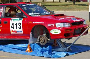 Erik Schmidt / Mike Rose Subaru Impreza receives repairs at parc expose.