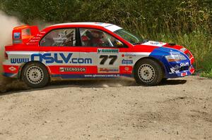 Alfredo DeDominicis / Massimo Daddovei at a 90-left on SS9 in their Mitsubishi Lancer Evo VII.