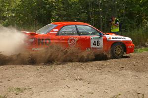 Matthew Johnson / Kim DeMotte Subaru WRX gets its photo taken by Lars Gagne on SS9.