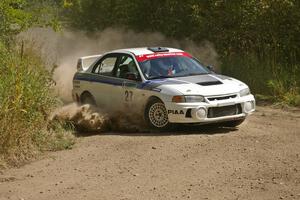 Chris Gilligan / Joe Petersen set up for a left-hander on SS9 in their Mitsubishi Lancer Evo IV.