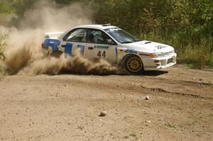 Henry Krolikowski / Cindy Krolikowski at a left-hander on SS9 in their Subaru WRX.