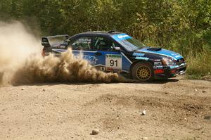 Jonathan Bottoms / Carolyn Bosley Subaru WTX STi at a 90-left on SS9 (1).