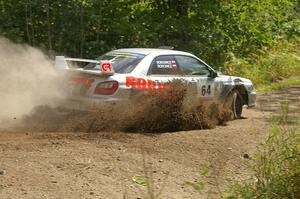 Robert Borowicz / Mariusz Borowicz power through a 90-left on SS9 in their Subaru WRX STi.