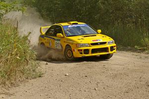 Mike Hurst / Russ Norton Subaru Impreza prepare for a hard left on SS9.