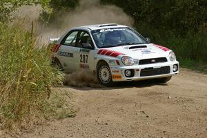 Dave Hintz / Rick Hintz set up for a left-hander on SS9 in their Subaru WRX.