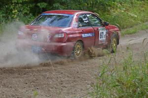 Bryan Pepp / Jerry Stang power out of a 90-left on SS9 in their Subaru WRX.