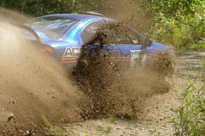 Cary Kendall / Scott Friberg Dodge SRT-4 slings gravel everywhere at a 90-left on SS9.