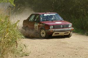 Matt Bushore / Karen Wagner prepare for a 90-left on SS9 in their VW Jetta.