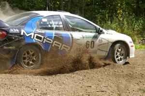 Bruce Davis / Jimmy Brandt power out of a hard-left on SS9 in their Dodge SRT-4.