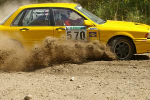 Erik Payeur / Adam Payeur Mitsubishi Galant slings gravel at a 90-left on SS9.