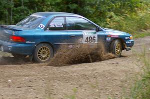 Martin Menning / Ryan Schnell Subaru Impreza at a left-hander on SS9.