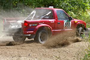 Jim Cox / Chris Stark hits the gas coming out of a left-hander on SS9 in their Chevy S-10.