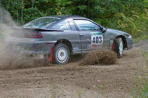 Erick Nelson / Greg Messler hit the gas coming out of a left-hander on SS9 in their Plymouth Laser.