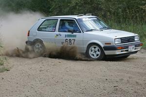 Chad Eixenberger / Jay Luikart VW Golf at a 90-degree left-hander on SS9.