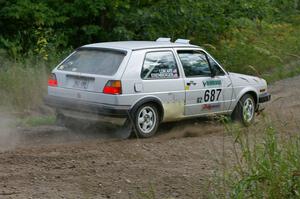 Chad Eixenberger / Jay Luikart VW Golf exits out of a left-hander on SS9.