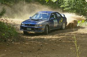 Kyle Sarasin / Stuart Sarasin do a beautiful job of drifting the car through a 90-right in their Subaru Impreza on SS13.