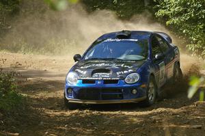 Cary Kendall / Scott Friberg power through a right-hander on SS13 in their Dodge SRT-4.