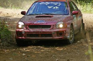 Bryan Pepp / Jerry Stang at a 90-right on SS13 in their Subaru WRX.