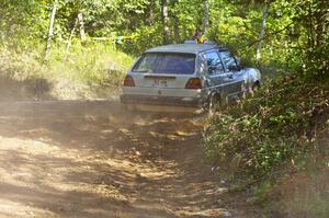 Chad Eixenberger / Jay Luikart VW Golf exit out of an uphill right-hander on SS13.