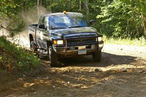 A gigantic Dodge diesel sweep truck.