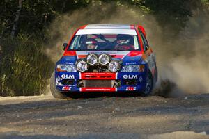 Alfredo DeDominicis / Massimo Daddovei go onto the county road on SS14 in their Mitsubishi Lancer Evo VII.