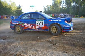 Otis Dimiters / Alan Ockwell at the SS14 spectator point at the county road in their Subaru WRX STi.