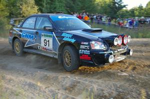 Jonathan Bottoms / Carolyn Bosley Subaru WTX STi at the spectator point on SS14.