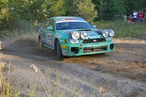 Eric Langbein / Jeremy Wimpey come into the spectator corner on SS14 in their Subaru WRX.