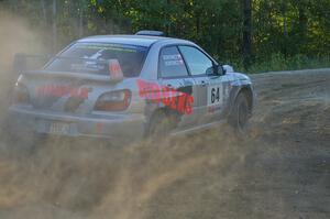 Robert Borowicz / Mariusz Borowicz power out of a right-hander at the spectator point on SS14 in their Subaru WRX STi.