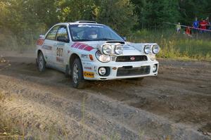 Dave Hintz / Rick Hintz drift through a right-hander at the spectator point on SS14 in their Subaru WRX.