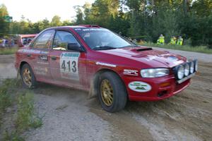 Erik Schmidt / Mike Rose at the spectator point on SS14 in their Subaru Impreza.