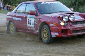 Bryan Pepp / Jerry Stang power away from the spectator point on SS14 in their Subaru WRX.