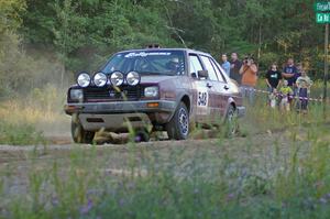 Matt Bushore / Karen Wagner drift past the throng of spectators at SS14 in their VW Jetta.